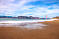 Baker Beach with a view of Golden Gate Bridge and the Marin Head