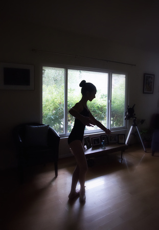 Practicing ballet in the living room